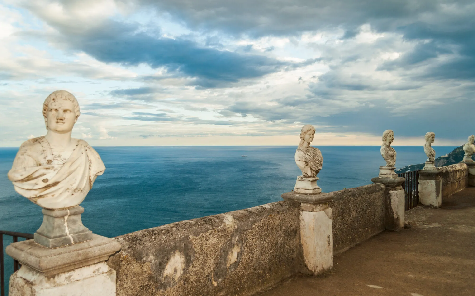 Stone busts lining the Terrace of Infinity at Villa Cimbrone in Ravello above the sea