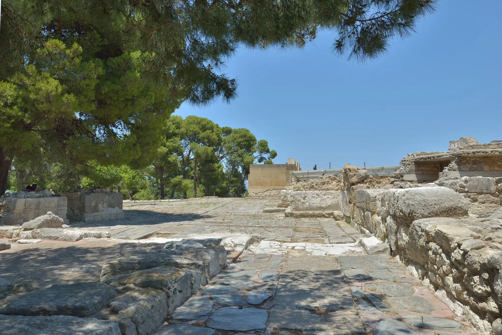 The west court and reconstructed red columns of the Minoan palace at Knossos, Crete