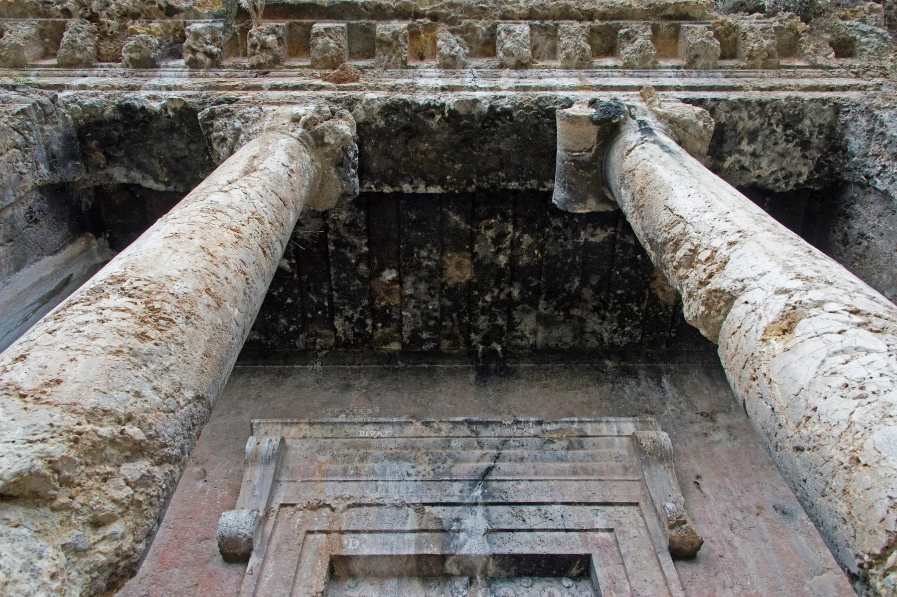 The Lycian rock tombs carved into the cliff above Fethiye in Turkey