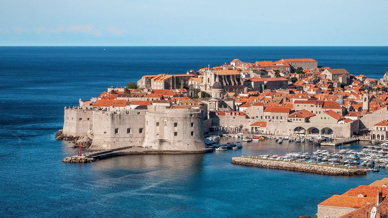 The walled Old Town of Dubrovnik and the Adriatic Sea at dusk, Croatia