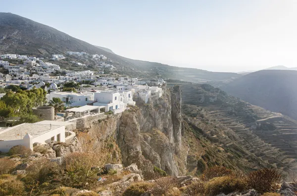The whitewashed hilltop village of Chora on Folegandros, one of the quiet Greek islands