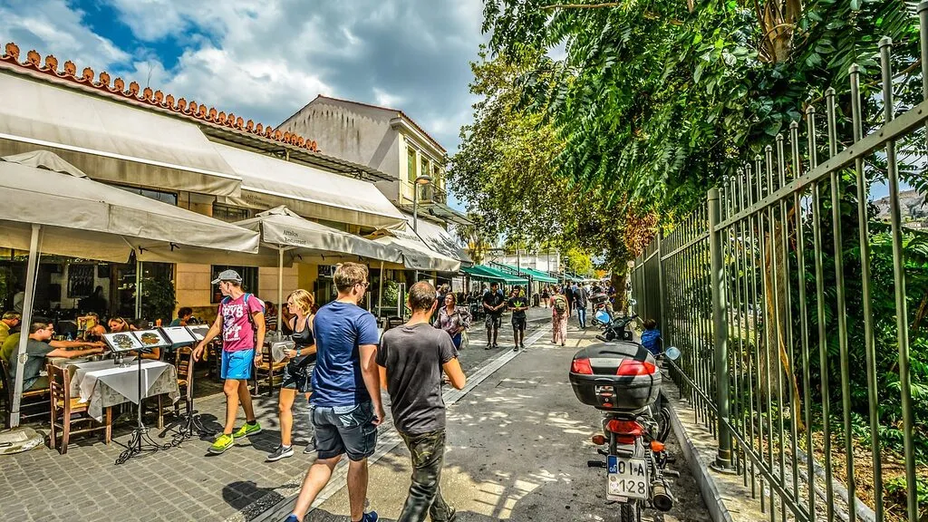 A sunny cafe-lined street in the Plaka and Monastiraki district of Athens