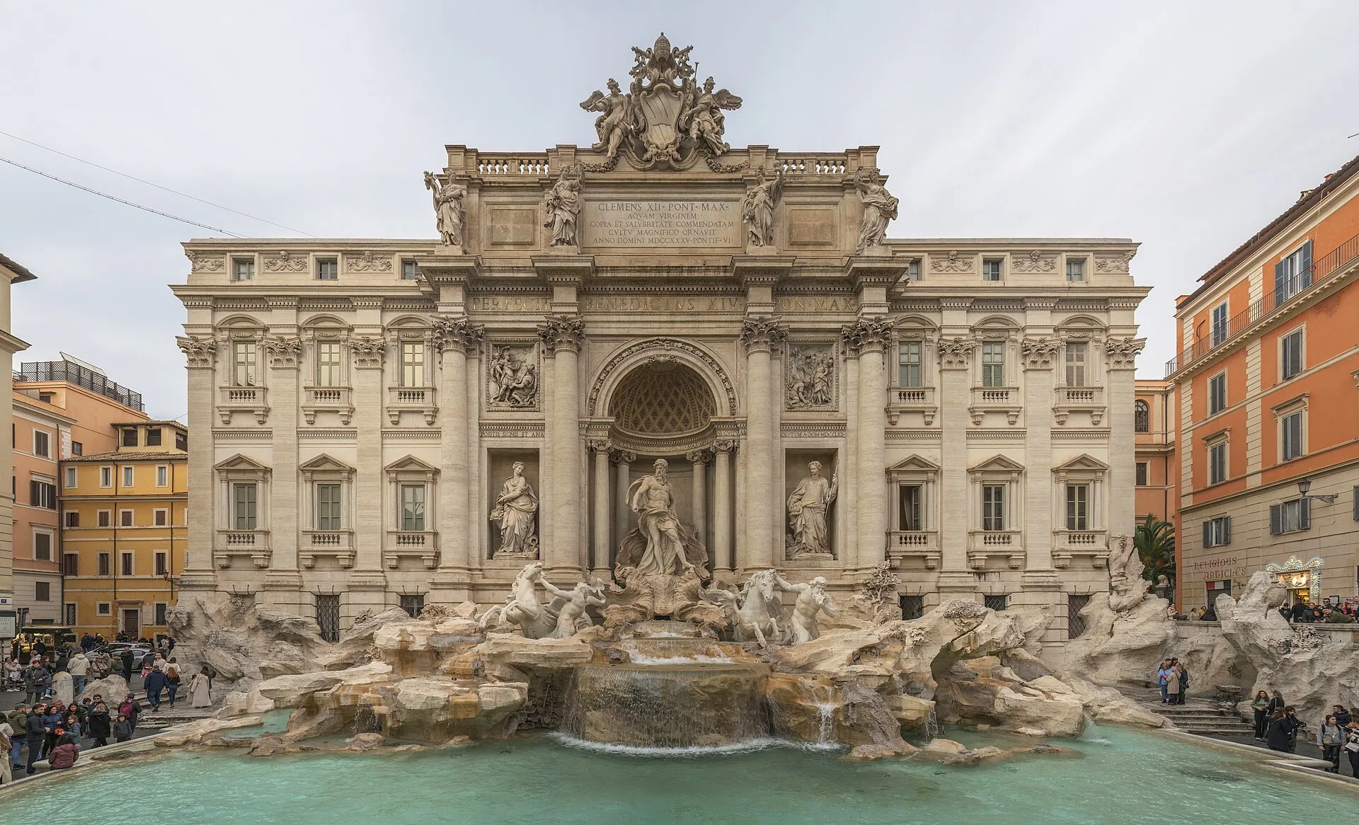 The Trevi Fountain in Rome with its baroque statues and travertine facade