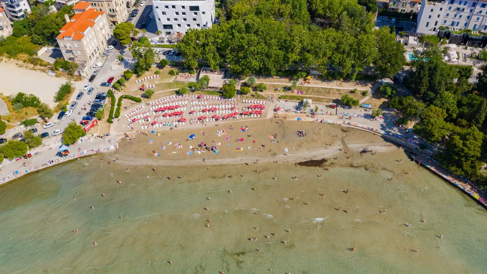 The sandy curve of Bacvice beach beside the city of Split, Croatia